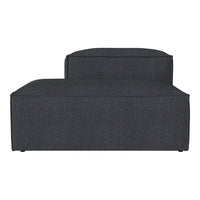 Dark gray upholstered chaise lounge with a smooth, textured fabric and minimalist design.