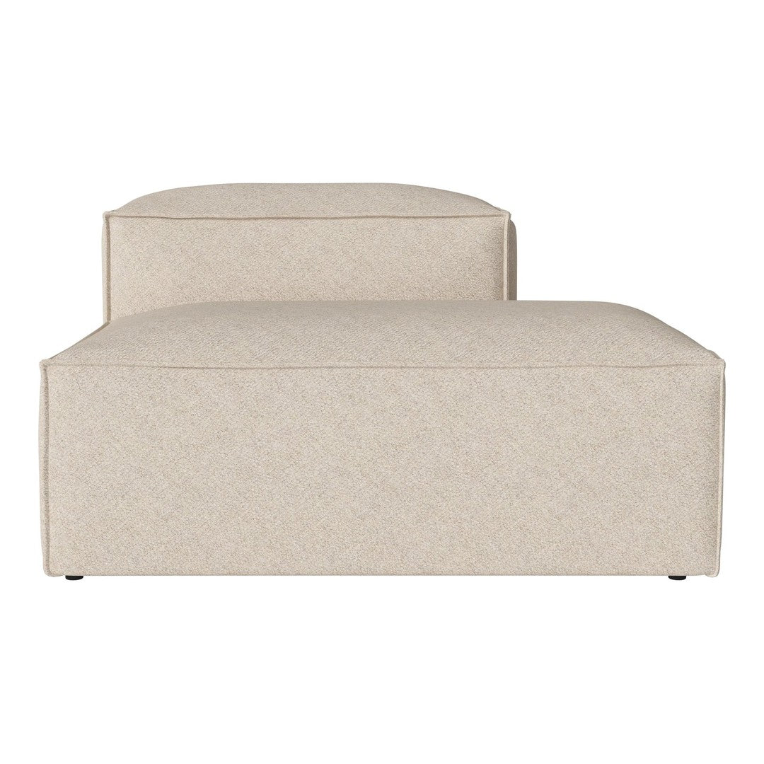 Beige upholstered ottoman with subtle texture, offering a clean, modern design suitable for various decor styles.