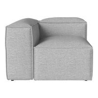 Gray textured fabric armchair with a modern, minimalist design. Perfect for stylish living spaces.