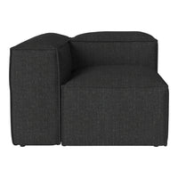Modern charcoal gray sectional couch with a textured fabric pattern, featuring a sleek and minimalist design.
