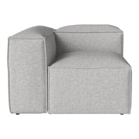 Gray upholstered modular chair with a contemporary, minimalist design and smooth texture. Ideal for modern interiors.