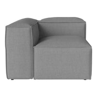 Gray modular sofa in a smooth fabric, featuring a contemporary, minimalist design with clean lines and no visible patterns.