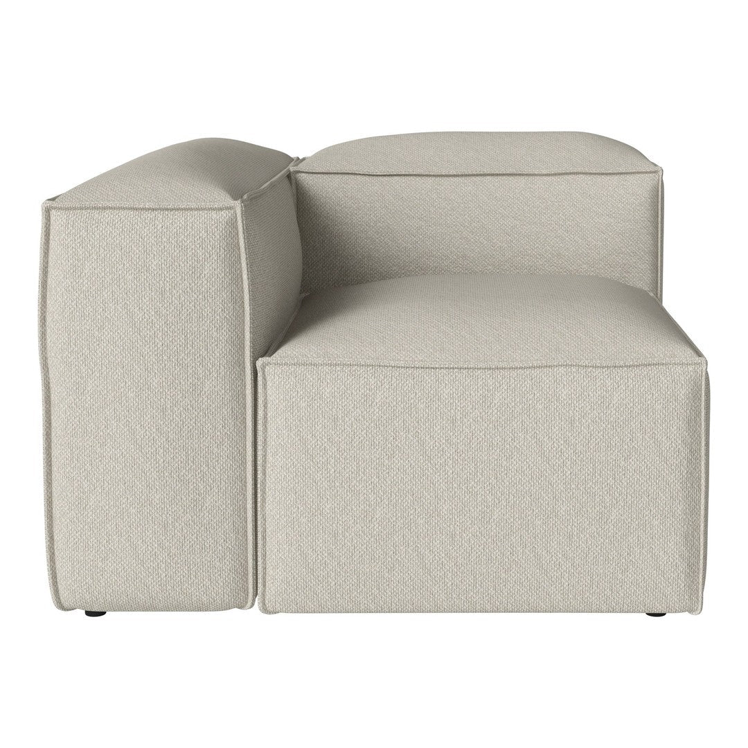 Light beige sectional couch with a smooth, textured fabric and modern minimalist design. Ideal for contemporary spaces.