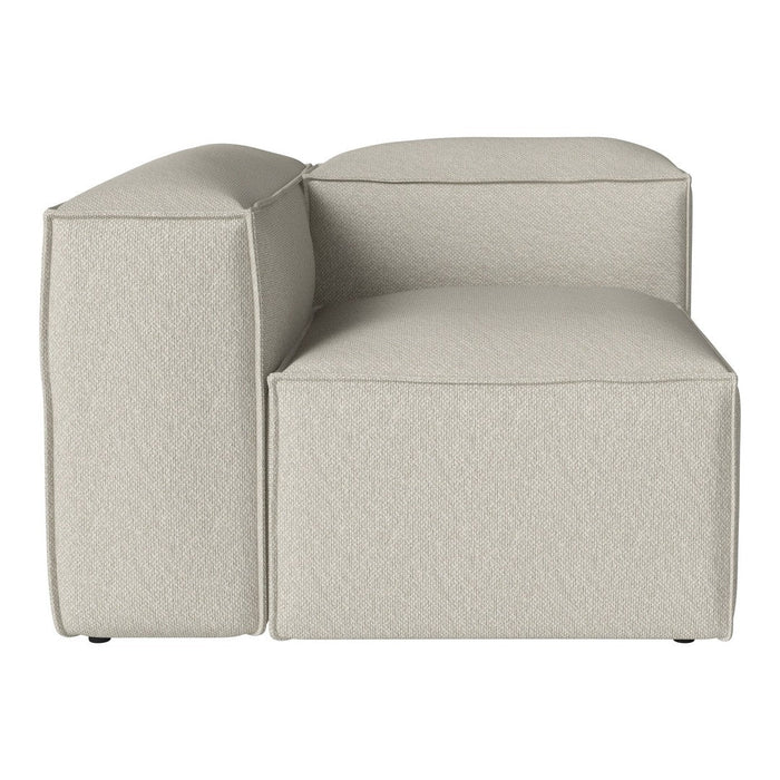Light beige sectional couch with a smooth, textured fabric and modern minimalist design. Ideal for contemporary spaces.
