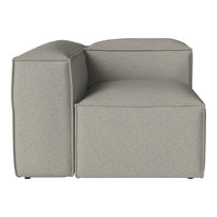 Gray textured sectional chair with a modern, minimalist design. Features clean lines and soft, neutral tones.