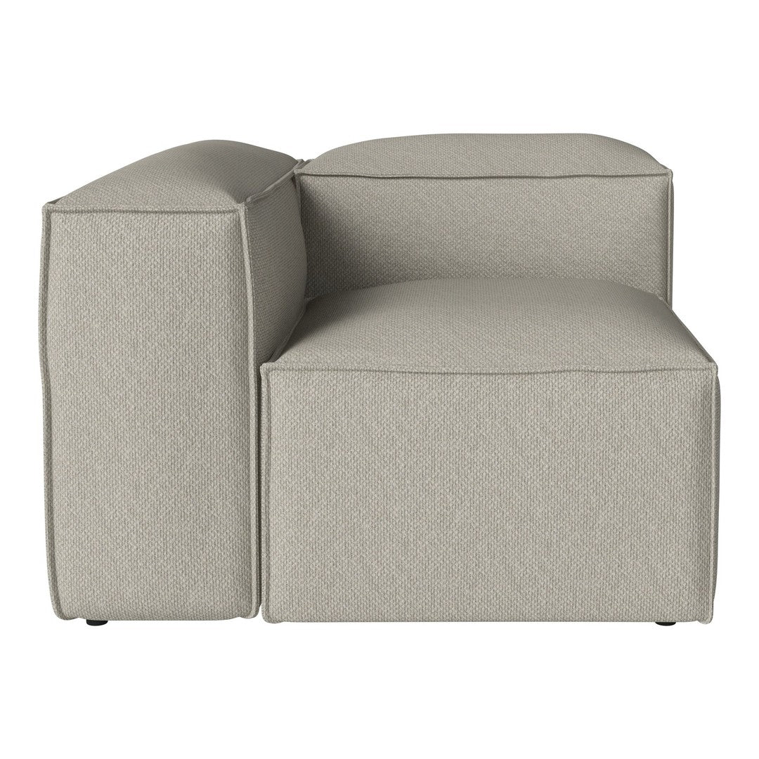 Light grey sectional sofa with a smooth, modern texture and minimalist design. Perfect for contemporary interiors.