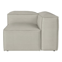 Light gray modular couch with a clean, minimalist design and smooth fabric texture, perfect for contemporary spaces.