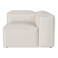 Beige upholstered modular sectional couch with clean lines and a minimalistic design, ideal for modern interiors.