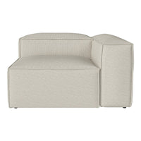 Light beige upholstered modular sofa with a textured pattern, featuring clean lines and a contemporary design.