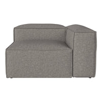 Gray upholstered modular sofa with a smooth, textured pattern and clean, modern lines. Perfect for contemporary decor.