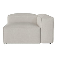 Light gray sectional sofa with a modern, minimalist design and smooth, textured fabric. Perfect for contemporary decor.