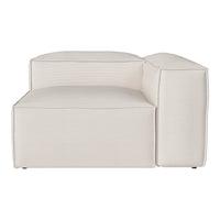 Modern beige modular sofa with sleek lines and subtle ribbed texture for a minimalist look. Perfect for any decor.