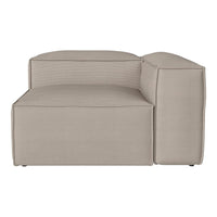 Beige modular sofa with subtle textured ribbed pattern and clean lines, perfect for modern interiors.