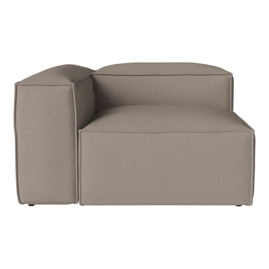 "Beige sectional sofa with smooth, modern contours and a textured, minimalist fabric pattern."