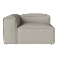 Light gray sofa section with a minimalist design, featuring clean lines and a textured fabric finish.