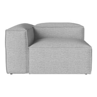 Light gray sectional sofa with a textured, woven pattern for a modern and minimalist look.