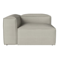 Light gray modular sofa with a smooth texture and minimalist design, perfect for modern living spaces.