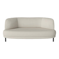 Light beige fabric sofa with a smooth, curved design and minimalist aesthetic. Perfect for modern interiors.