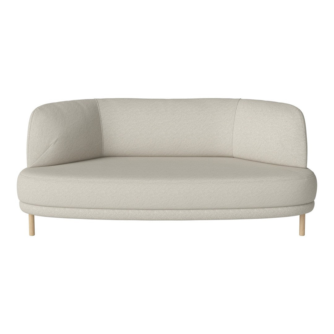 Soft beige curved sofa with light wooden legs, featuring a minimalist design and smooth upholstery.