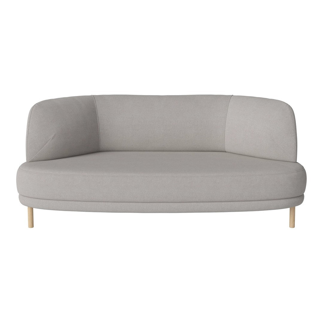 Light gray curved sofa with smooth fabric and natural wooden legs, featuring a minimalist design.