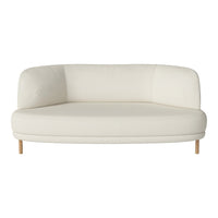 Curved white sofa with a smooth fabric finish and natural wood legs, featuring a minimalist, modern design.