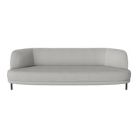 Light gray sofa with a smooth, minimalist design and rounded edges, featuring a soft fabric texture.