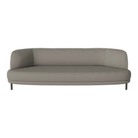 Stylish gray sofa with smooth, minimalist design and modern curved silhouette. Perfect for contemporary living spaces.