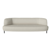 Light beige curved sofa with smooth fabric surface and subtle texture, featuring sleek black legs for a modern look.