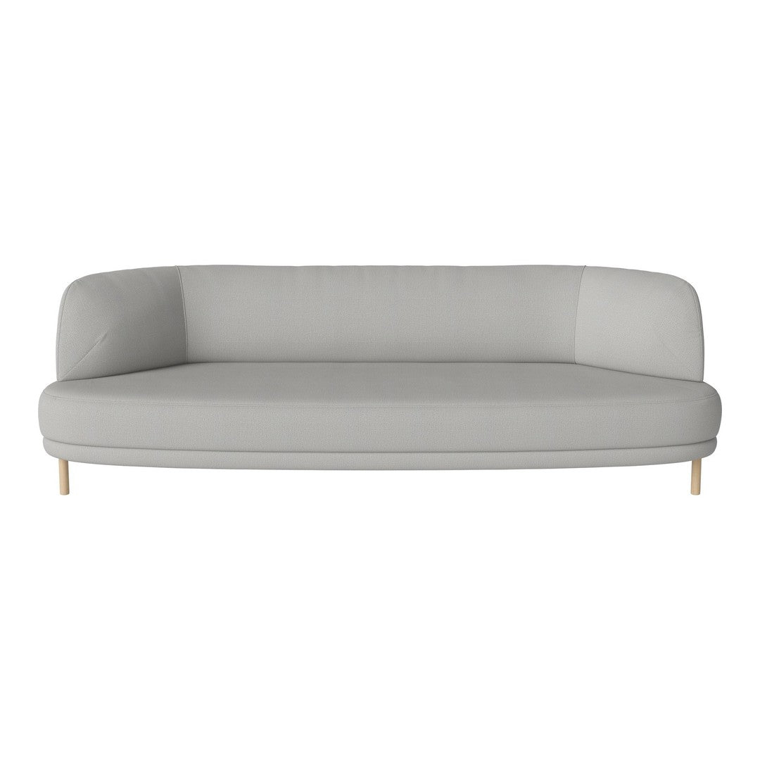 Light grey curved sofa with a smooth fabric texture and natural wood legs, perfect for modern interiors.