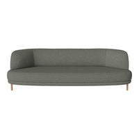 Modern gray curved sofa with smooth upholstery and sleek wooden legs, perfect for minimalist decor.