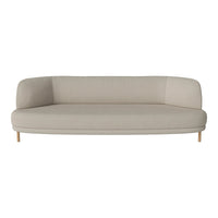 Light beige couch with a smooth, minimalist design and natural wooden legs, perfect for modern decor.