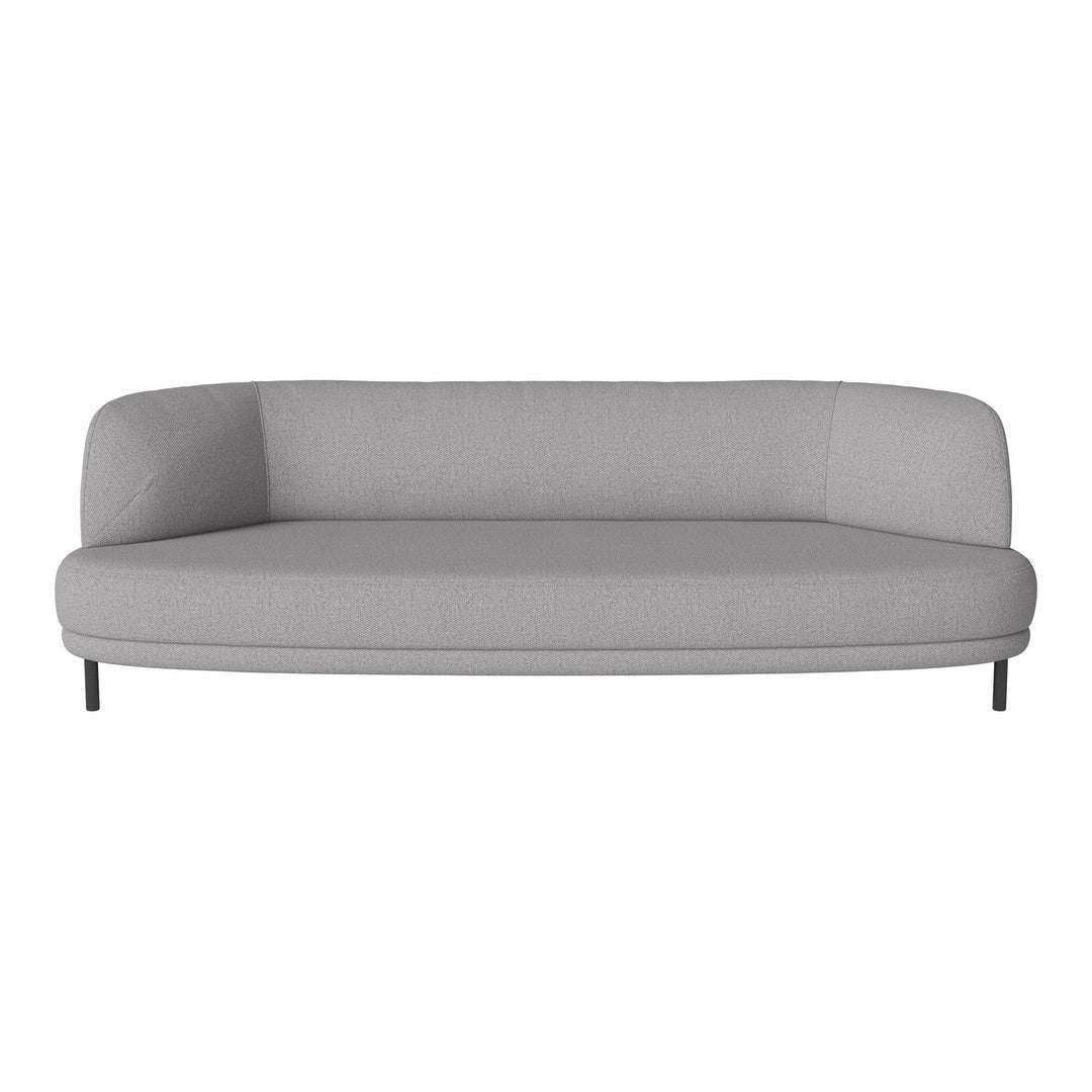 Light gray curved sofa with a minimalist design and solid fabric, complemented by sleek black metal legs.