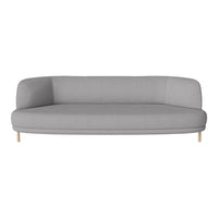 Gray curved sofa with smooth fabric and light wood legs, perfect for modern living room decor.