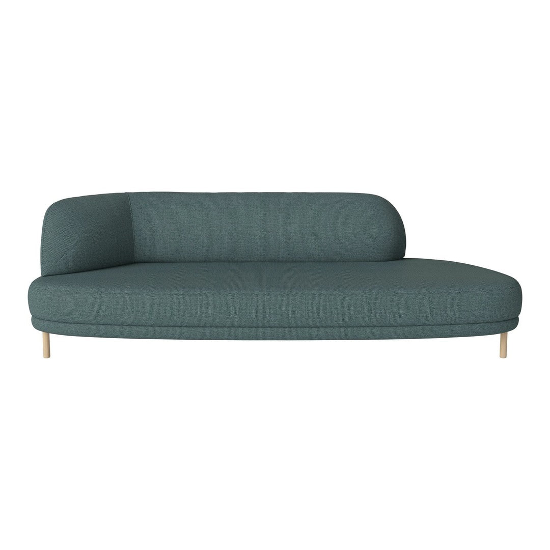 Teal curved couch with a smooth, textured fabric and minimalist design, perfect for modern living spaces.