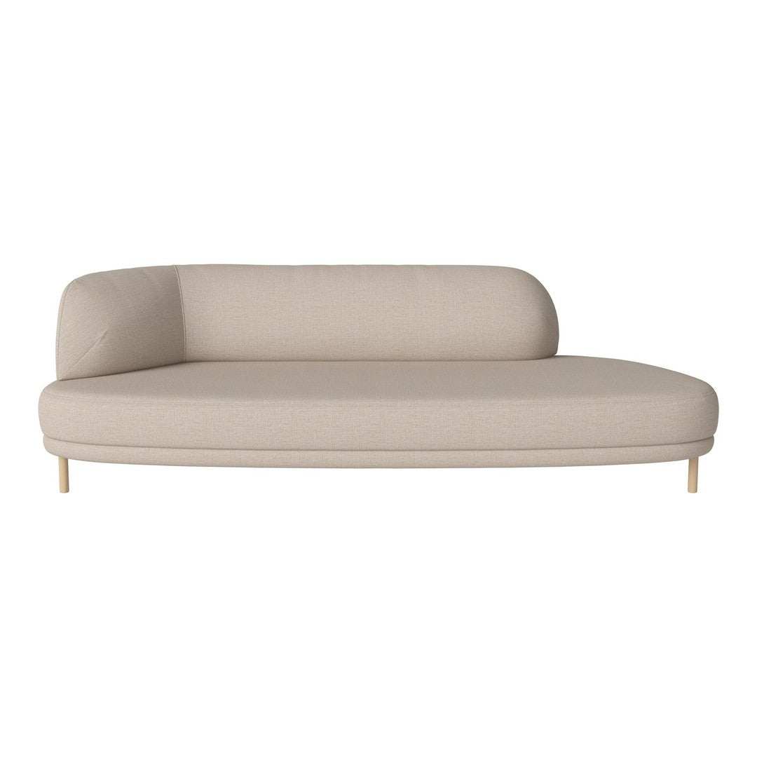 Beige modern sofa with smooth texture and minimalist design, featuring soft curves and tapered wooden legs.