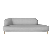 Grey upholstered sofa with a smooth, modern design and light wooden legs, featuring a minimalist, contemporary pattern.