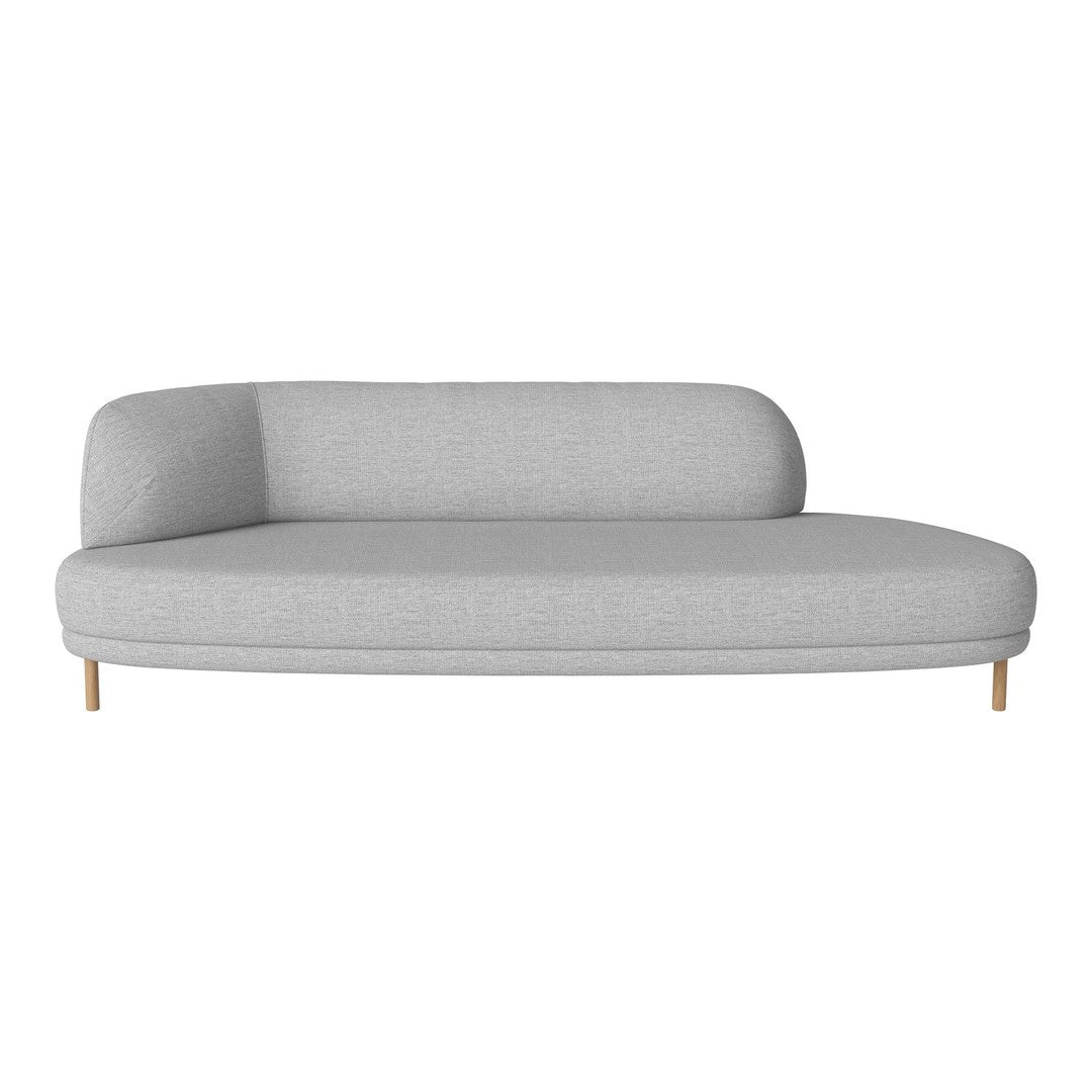 Light gray curved sofa with smooth fabric and minimalist design, complemented by wooden legs.