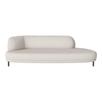 Light beige modern sofa with a sleek, curved design and minimal patterns, perfect for contemporary living spaces.
