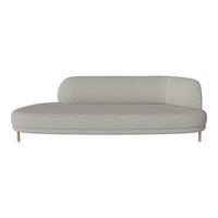 Light gray curved sofa with a smooth fabric texture and natural wood legs, perfect for modern interiors.