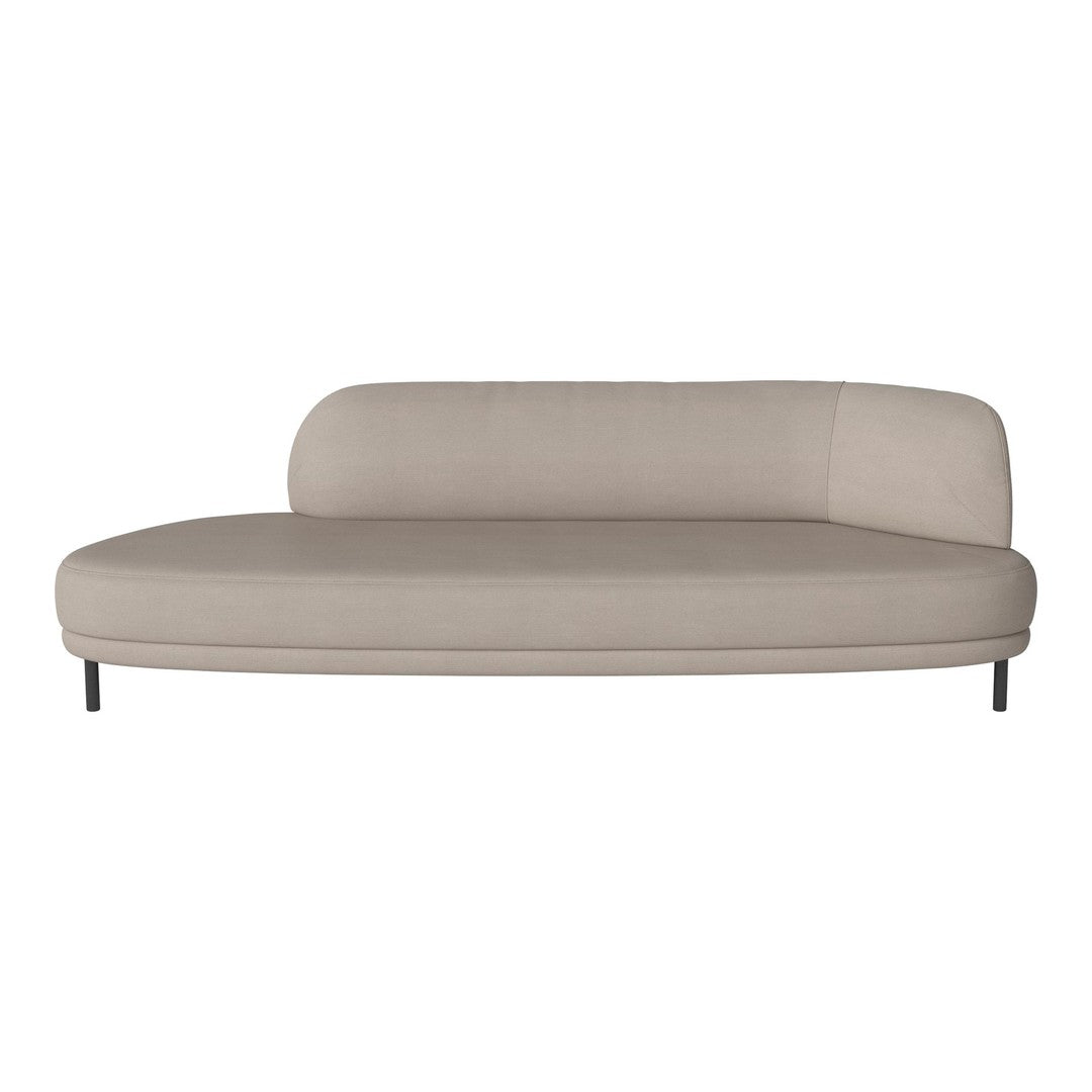 Beige curved sofa with a smooth, minimalist design and subtle texture on a sleek metal base. Ideal for contemporary decor.