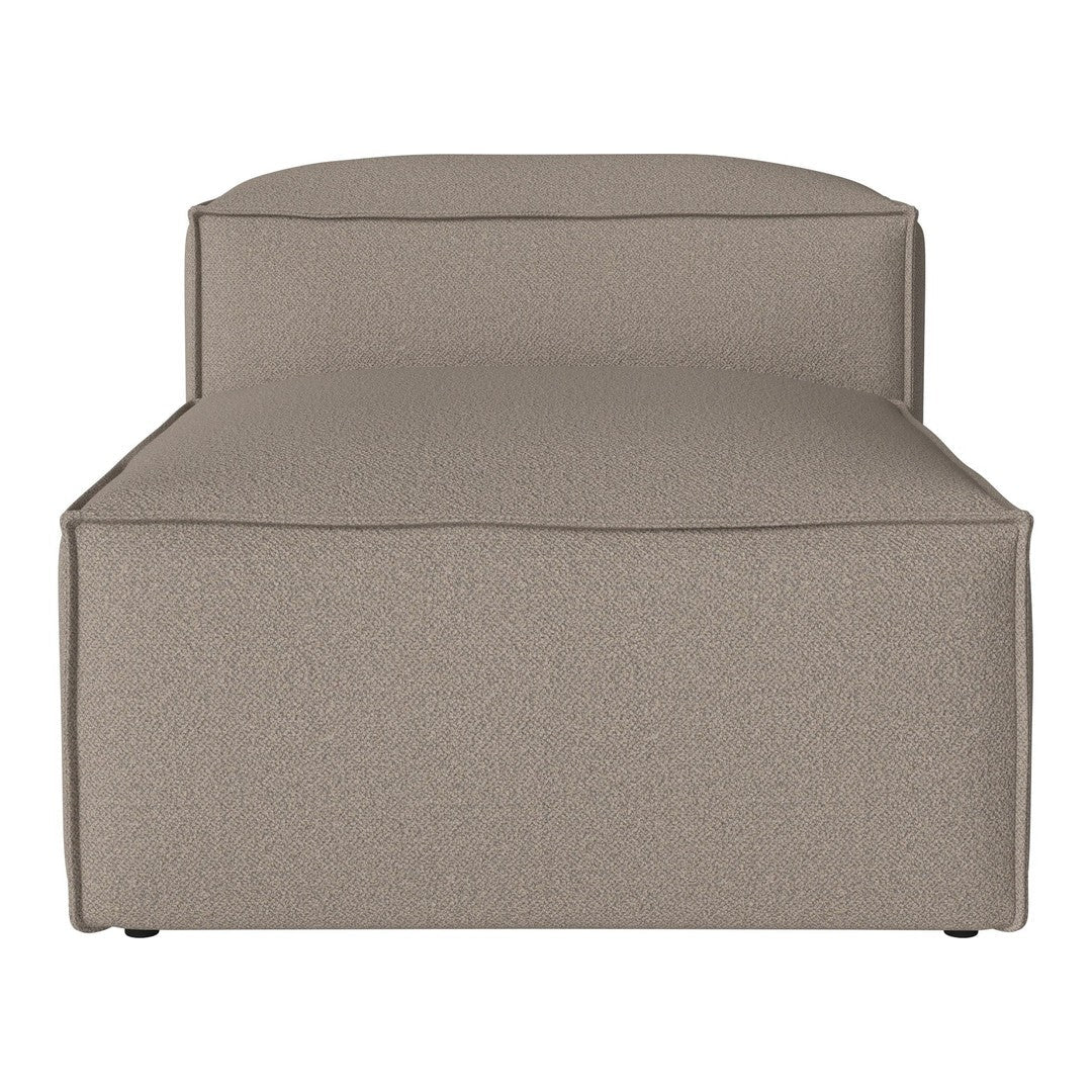 Neutral beige chaise lounge with a smooth, minimalist texture, perfect for modern decor.