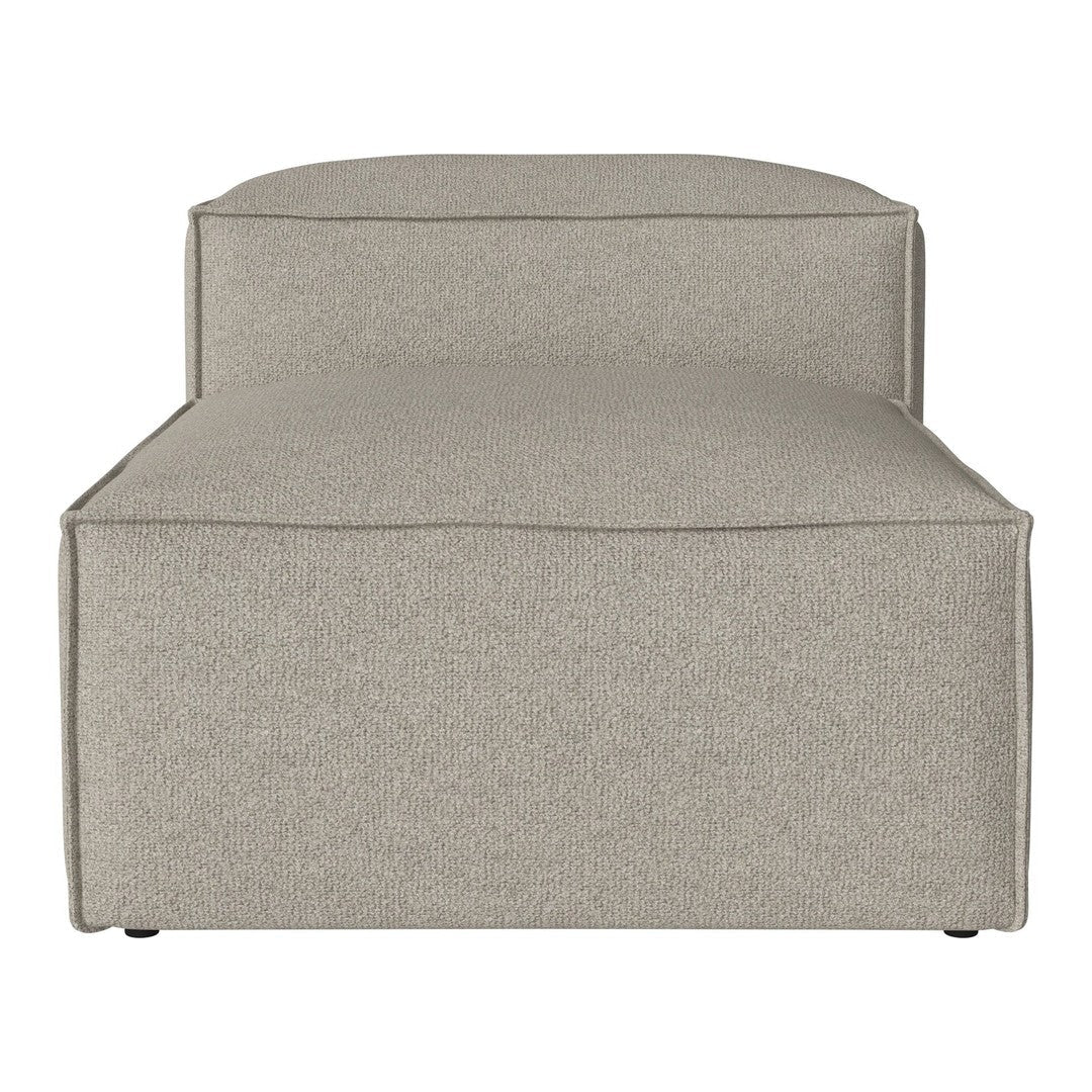 Beige upholstered chaise lounge with a smooth, minimalist design. Neutral tones for versatile decor.
