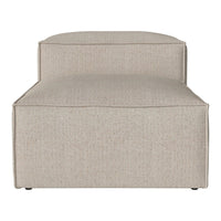 Beige upholstered chaise lounge with a subtle textured pattern. Ideal for modern and neutral decor.