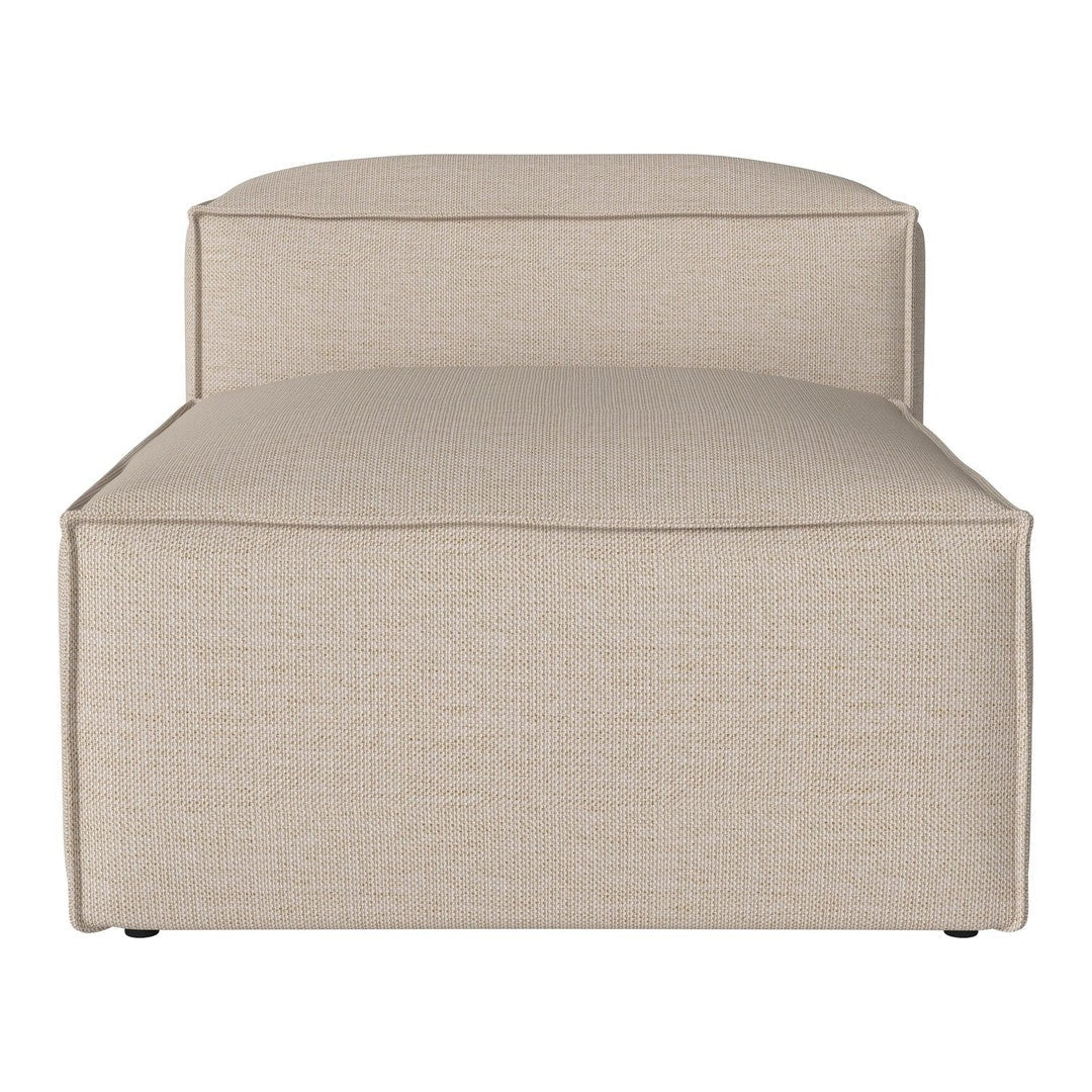 Beige upholstered chaise lounge with a subtle textured pattern, perfect for modern decor.