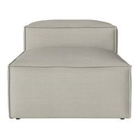 Light beige upholstered chaise lounge with a smooth, minimalist design and subtle stitching details.
