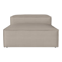 Beige modular sofa with a smooth, solid fabric and clean lines, perfect for modern living spaces.