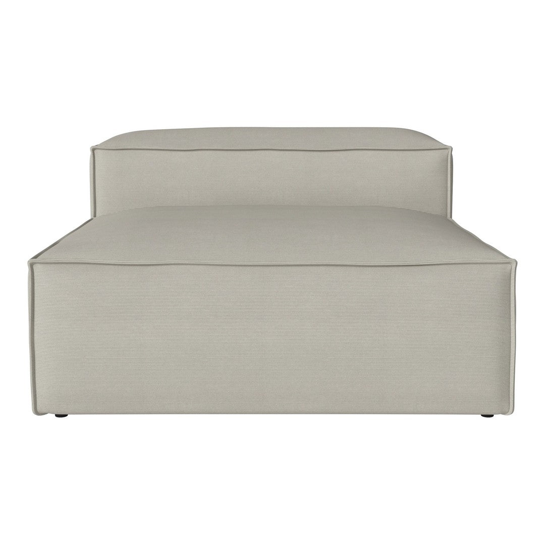 Light beige lounge chair with a textured pattern, featuring clean lines and a modern design. Perfect for any decor.