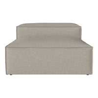 Light beige sofa with a smooth, modern design and no distinct patterns, perfect for minimalist decor.