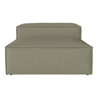 Olive green fabric sofa with a smooth texture and minimalistic design. Perfect for modern living spaces.
