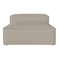 Beige upholstered sofa with a sleek, minimalist design and subtle stitching details. Perfect for modern decor.